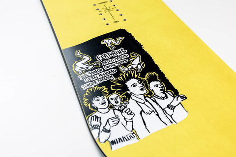 Nitro Alternator 2027 yellow snowboard with punk-themed graphic and rider names on base