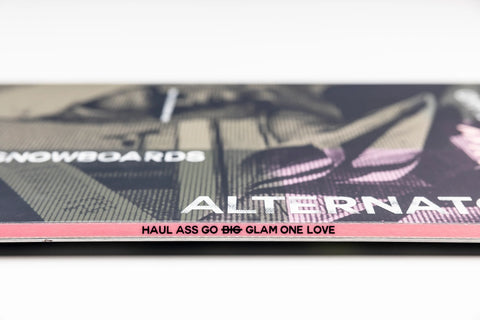 Nitro Alternator x Hailey snowboard edge detail, black graphic with pink sidewall