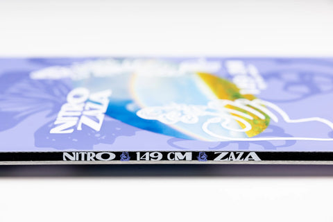 Nitro Zaza 149cm snowboard side profile, purple graphic top sheet