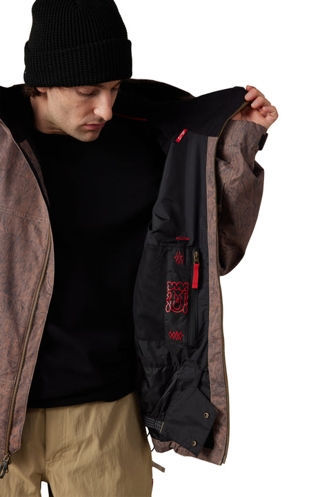 686 Men's Dojo Shell Jacket in brown texture, interior pockets and red accents shown