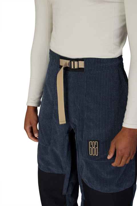686 men's navy corduroy snow pant with tan webbing belt and logo patch