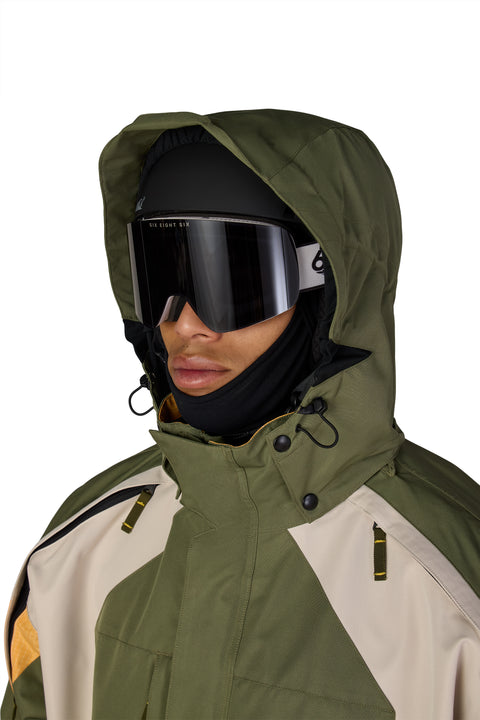 686 Men's 2003 Atom Jacket in olive green and tan colorblock with hood up