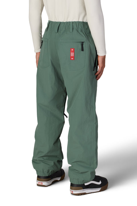 686 Men's Dojo Shell Pant in sage green, back view with cargo pockets
