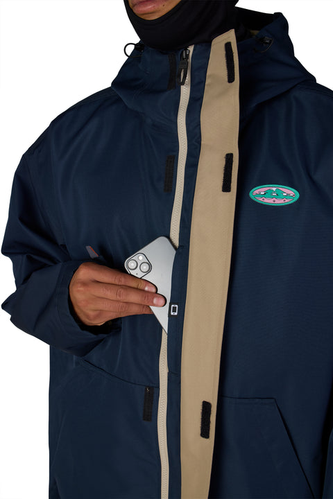 686 Men's 1994 Liberty Jacket in navy blue with tan zip placket and chest patch logo
