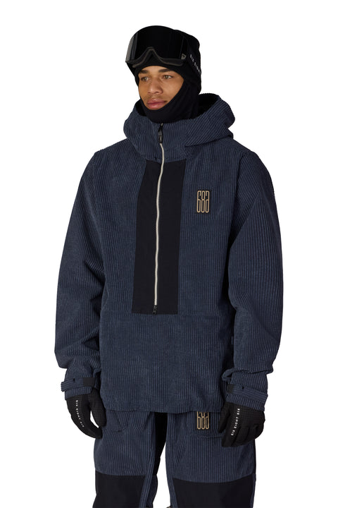 686 Men's navy corduroy anorak snowboard jacket with black panel and gold logo