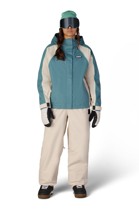 686 Women's Hologram Shell Jacket in teal and cream colorblock with hood
