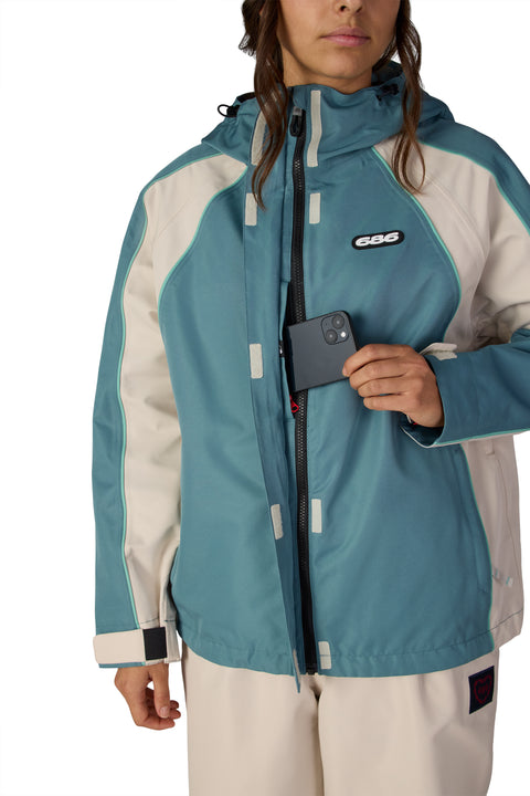 686 women's teal and cream colorblock shell jacket with interior phone pocket