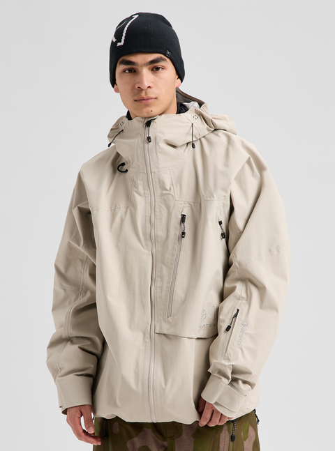 Burton men's tan GORE-TEX hooded snow jacket with zippered pockets and adjustable hood