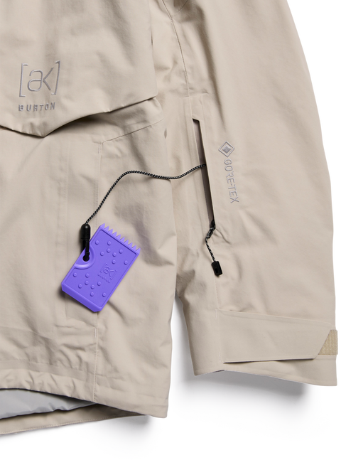 Burton [ak] Cyclic GORE-TEX 2L jacket in tan with purple hangtag and zipper pocket