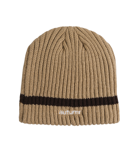Autumn Stamnes ribbed knit beanie in tan with dark brown stripe accent