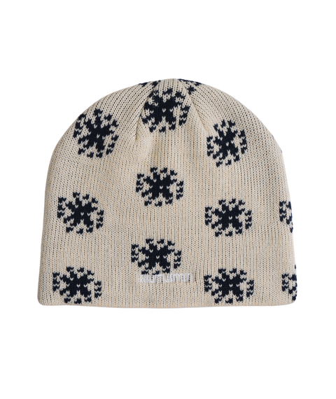 Cream knit beanie with navy blue snowflake pattern and Autumn logo embroidery
