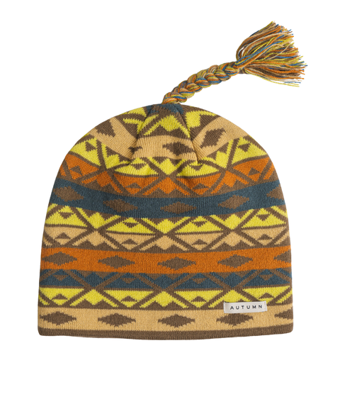 Autumn Piste Tassel Beanie with geometric Southwestern pattern and braided tassel on top