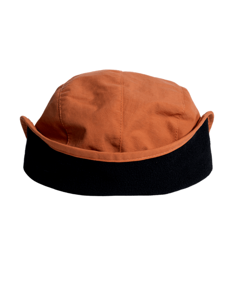 Autumn DWR Flap Cap with two-tone design featuring ear flaps and structured crown