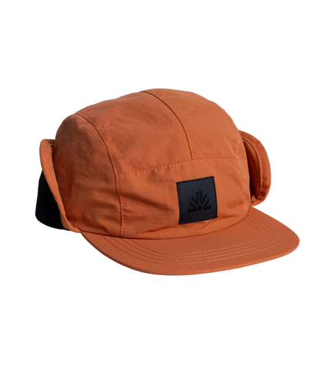 Autumn DWR Flap Cap with ear flaps, structured brim, and embroidered logo patch