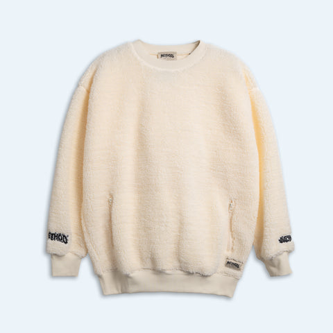 Cream sherpa crew sweatshirt with zip pockets and Method Mag logo sleeve patches