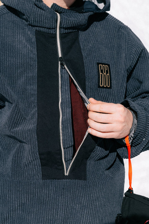 686 Men's Ghost 2.5L Anorak in dark blue corduroy with zip opening and red lining
