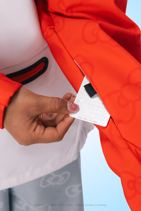 686 Women's Hello Kitty red waterproof hoodie care label detail inside sleeve