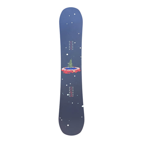 Navy blue twin snowboard with fern and trampoline graphic, white dot details