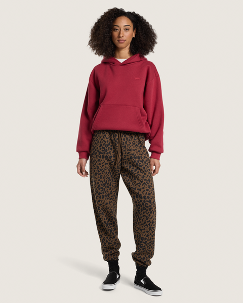 Brown leopard print fleece jogger pants with drawstring waist and cuffed ankles