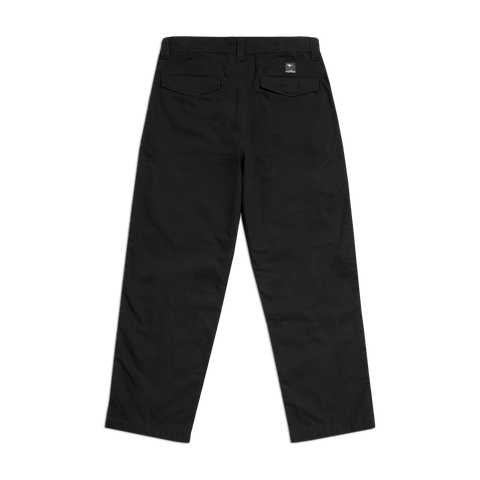 Vans x Atiba black wide-leg cargo pants, back view with two flap pockets