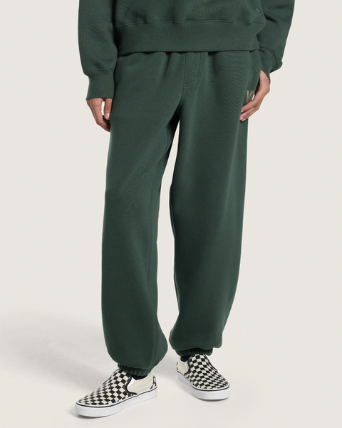 Vans men's dark green fleece jogger sweatpants with ribbed cuffs and checkered slip-on sneakers
