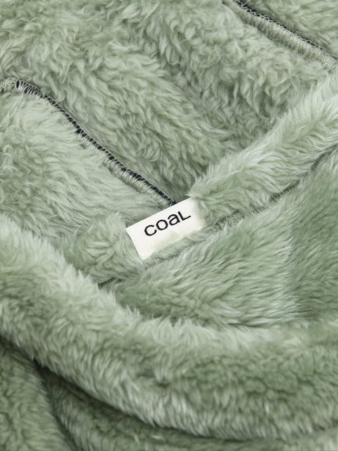 Close-up detail of soft sage green sherpa fleece hood with Coal brand label visible