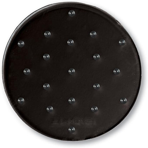 Dakine circular traction mat with raised spike nubs on black rubber surface