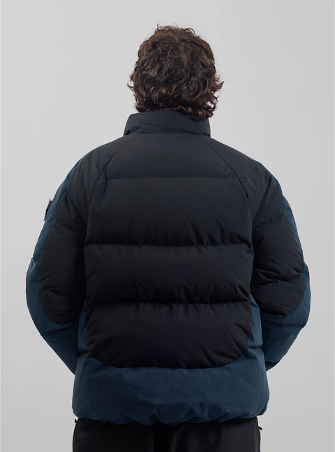 Analog Toughy Puffy Down Jacket in black and dark teal, back view