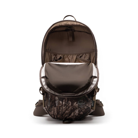 Herschel backpack open interior view showing padded laptop sleeve and organizational pockets