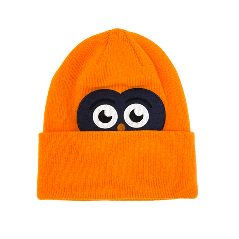 Orange knit youth beanie hat with embroidered owl face peeking over the folded cuff