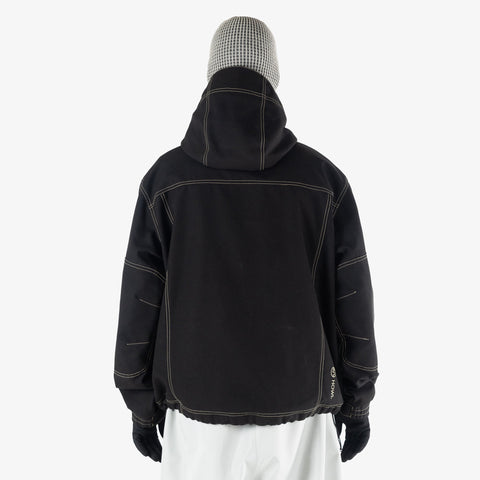 Back view of Howl workwear hooded jacket with contrast stitching and gloves on model