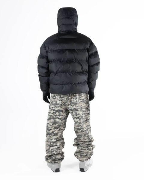 Back view of men's black puffer jacket with hood, paired with camouflage snow pants