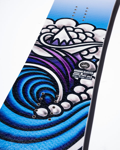 Lib Tech Banana Blaster snowboard top sheet featuring swirling wave and cloud graphic design