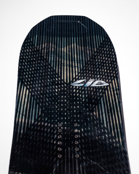 Close-up detail of Lib Tech Apex Orca II snowboard top sheet showing graphic texture and logo