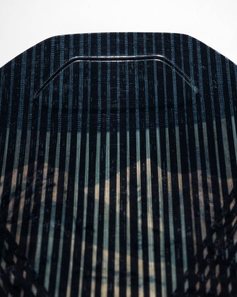 Close-up detail of Lib Tech Apex Orca II snowboard deck showing striped graphic pattern