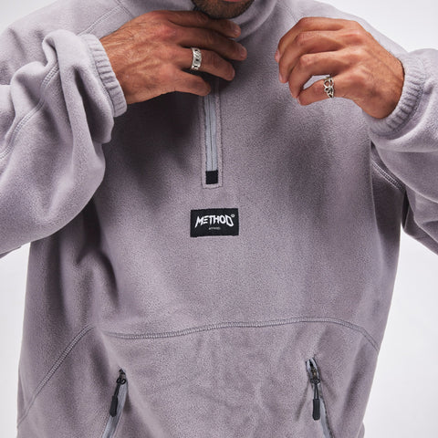 Method Apparel quarter-zip fleece pullover with chest label and dual lower zip pockets