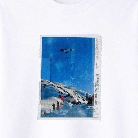 Close-up of white long sleeve t-shirt with snowboarding photo graphic print on chest