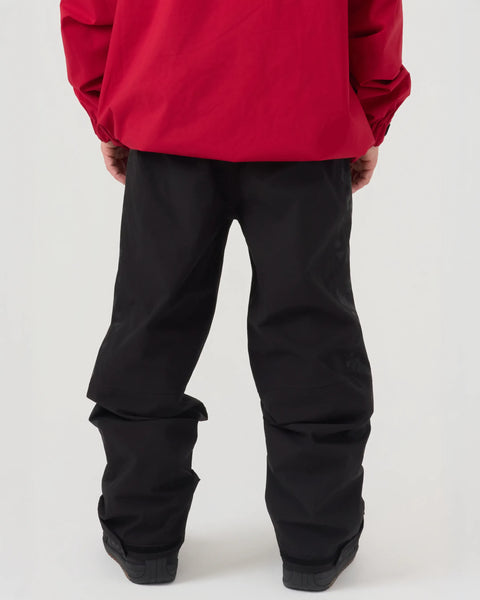 Back view of men's black snow pants with articulated knees and boot gaiters